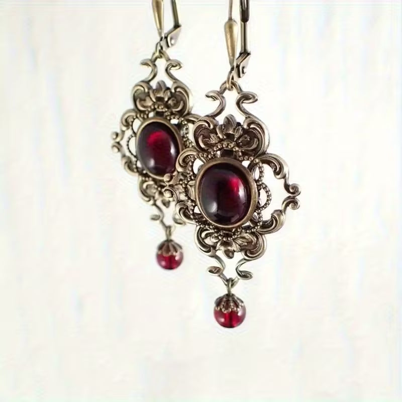 Pendientes de gema roja