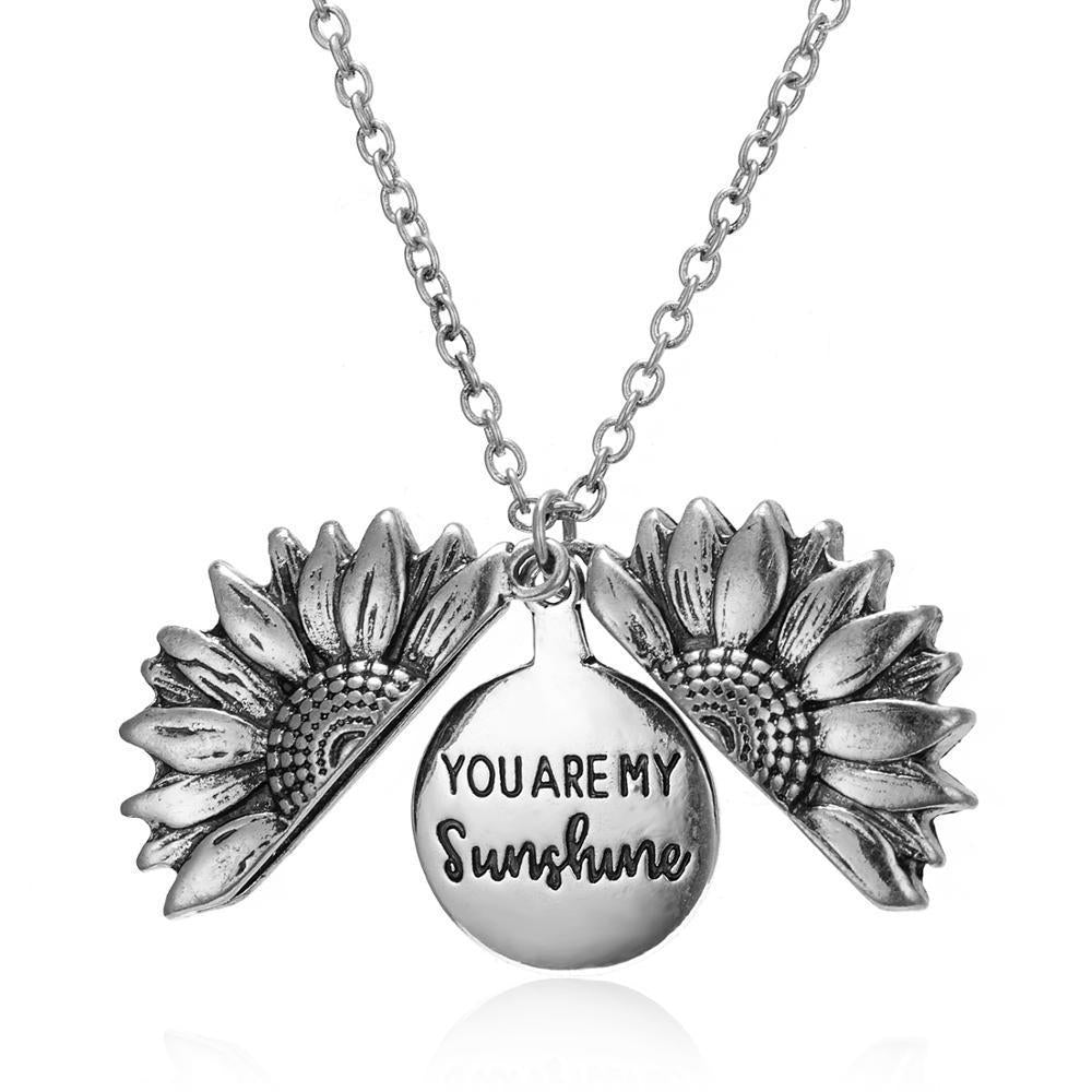 Colgante de girasol plateado