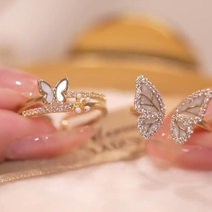 Anillos gemelos con diseño de aleteo elegante