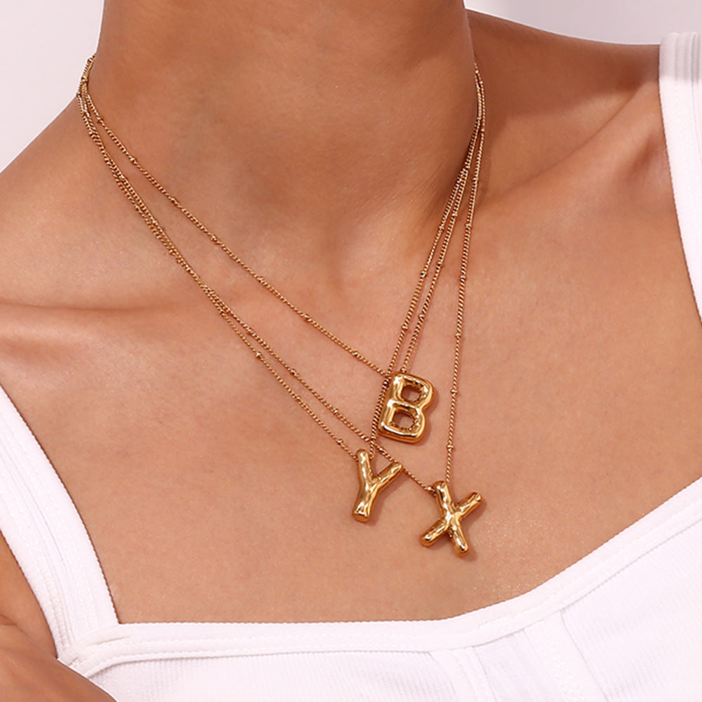 Collar personalizado de inicial con burbujas