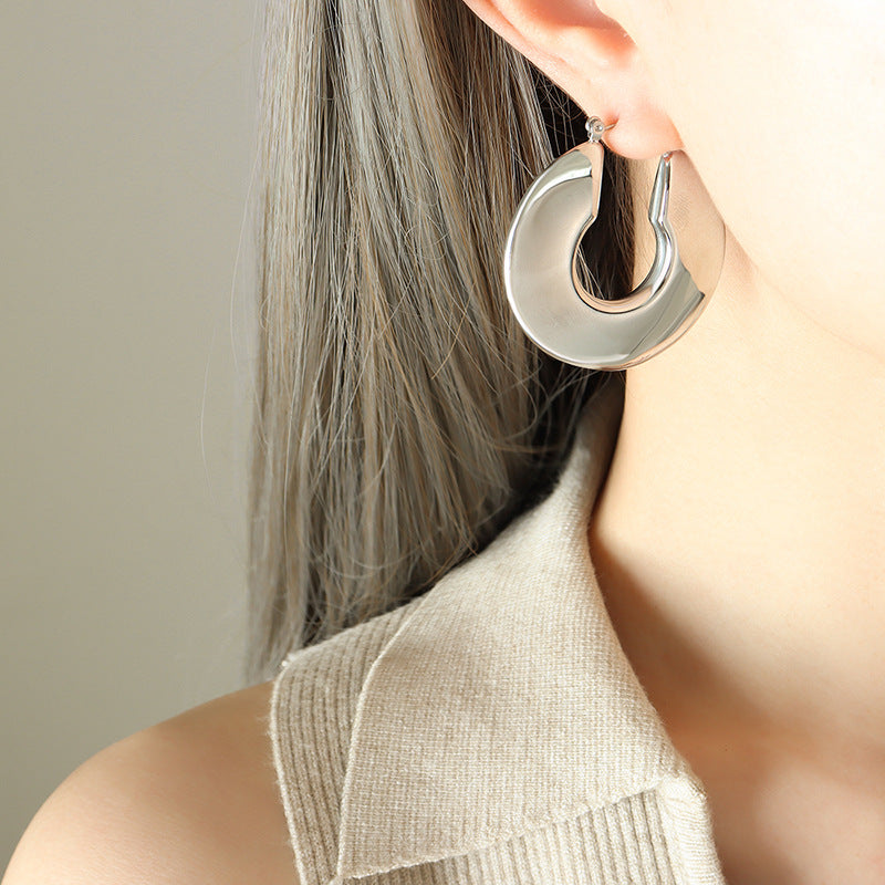 Pendientes de aro dorado Sol