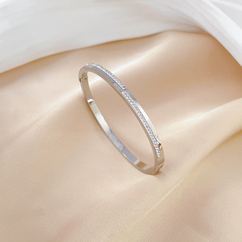 Pulsera rígida de cristal dorado Aera