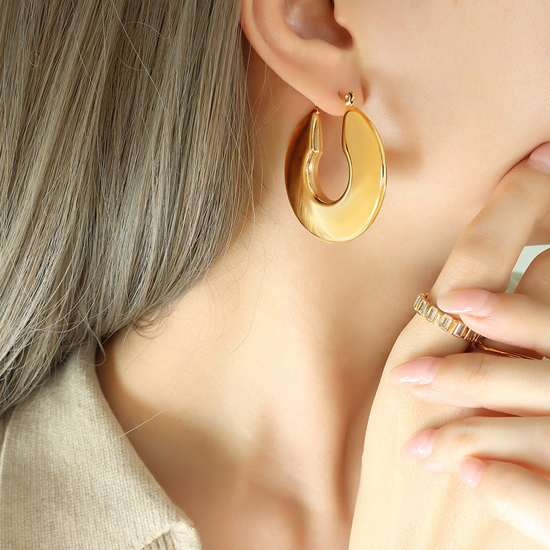 Pendientes de aro dorado Sol