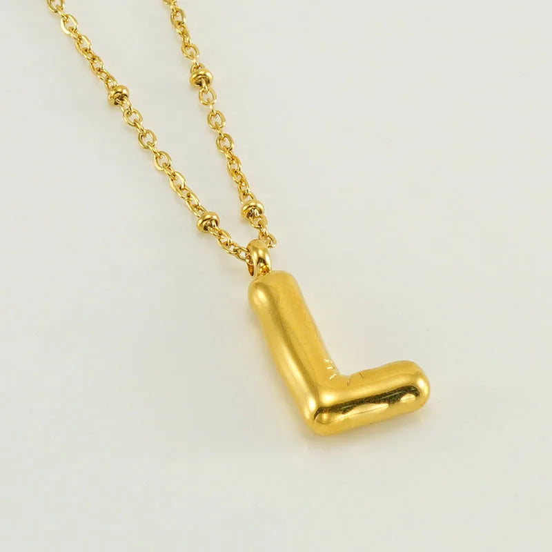 Collar especial de luz dorado de 18 quilates con esfera especial y letra inicial