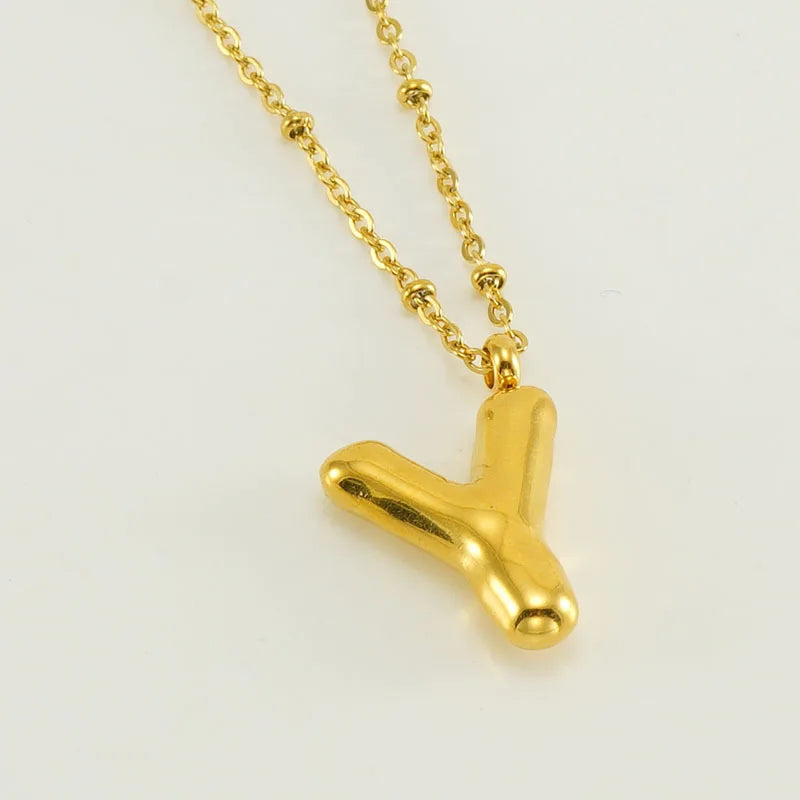 Collar especial de luz dorado de 18 quilates con esfera especial y letra inicial