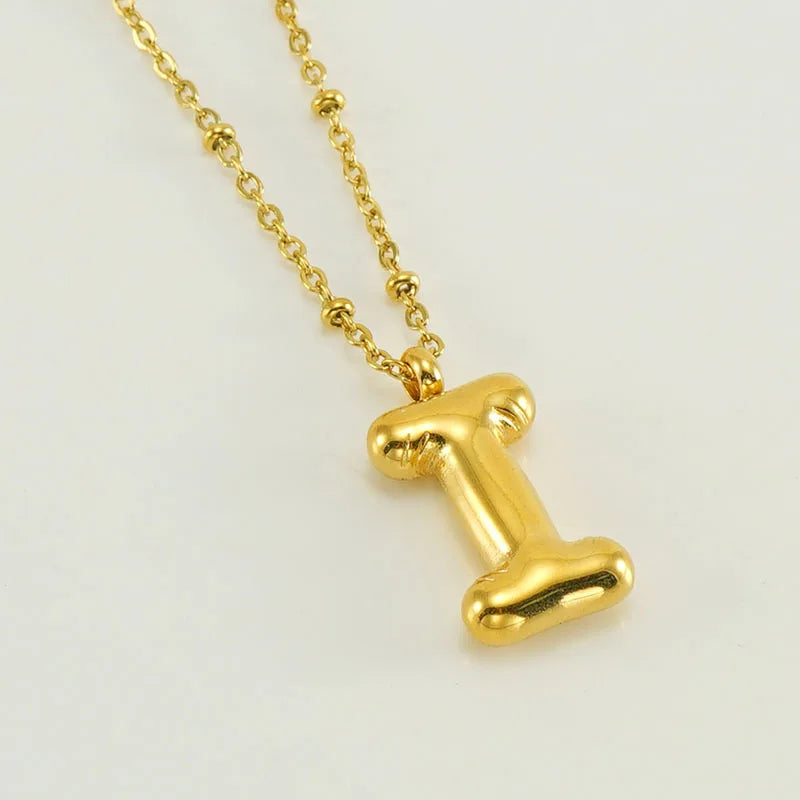 Collar especial de luz dorado de 18 quilates con esfera especial y letra inicial