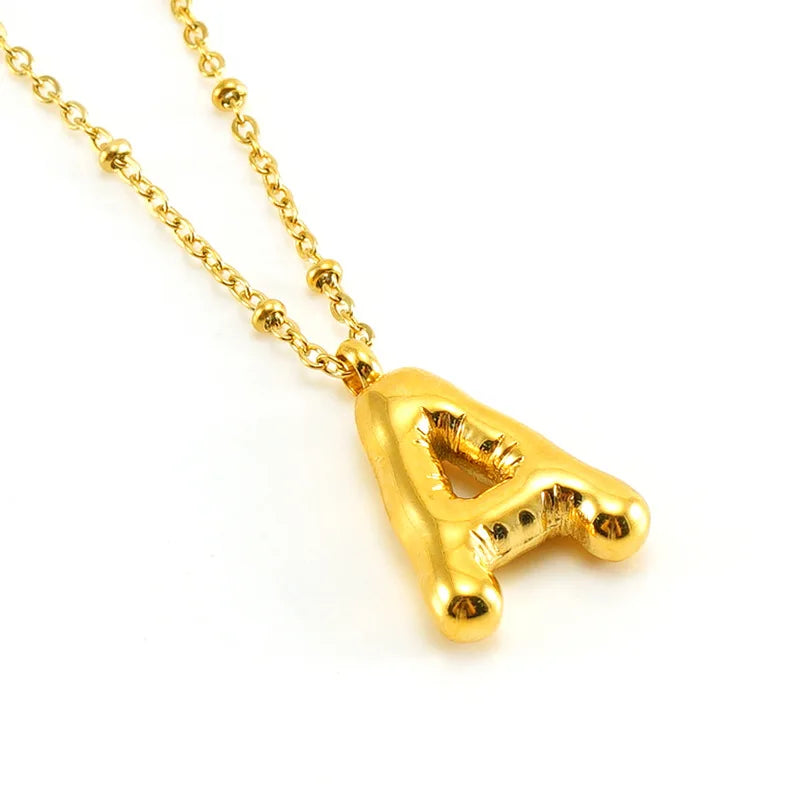 Collar especial de luz dorado de 18 quilates con esfera especial y letra inicial