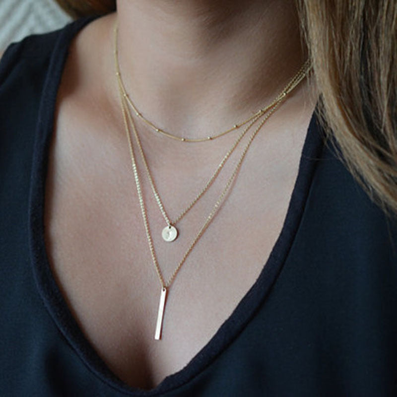Collar vintage de cadenas superpuestas con colgante geométrico