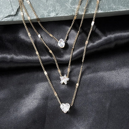 Collar Multicapa Triple con Dijes de Zirconia