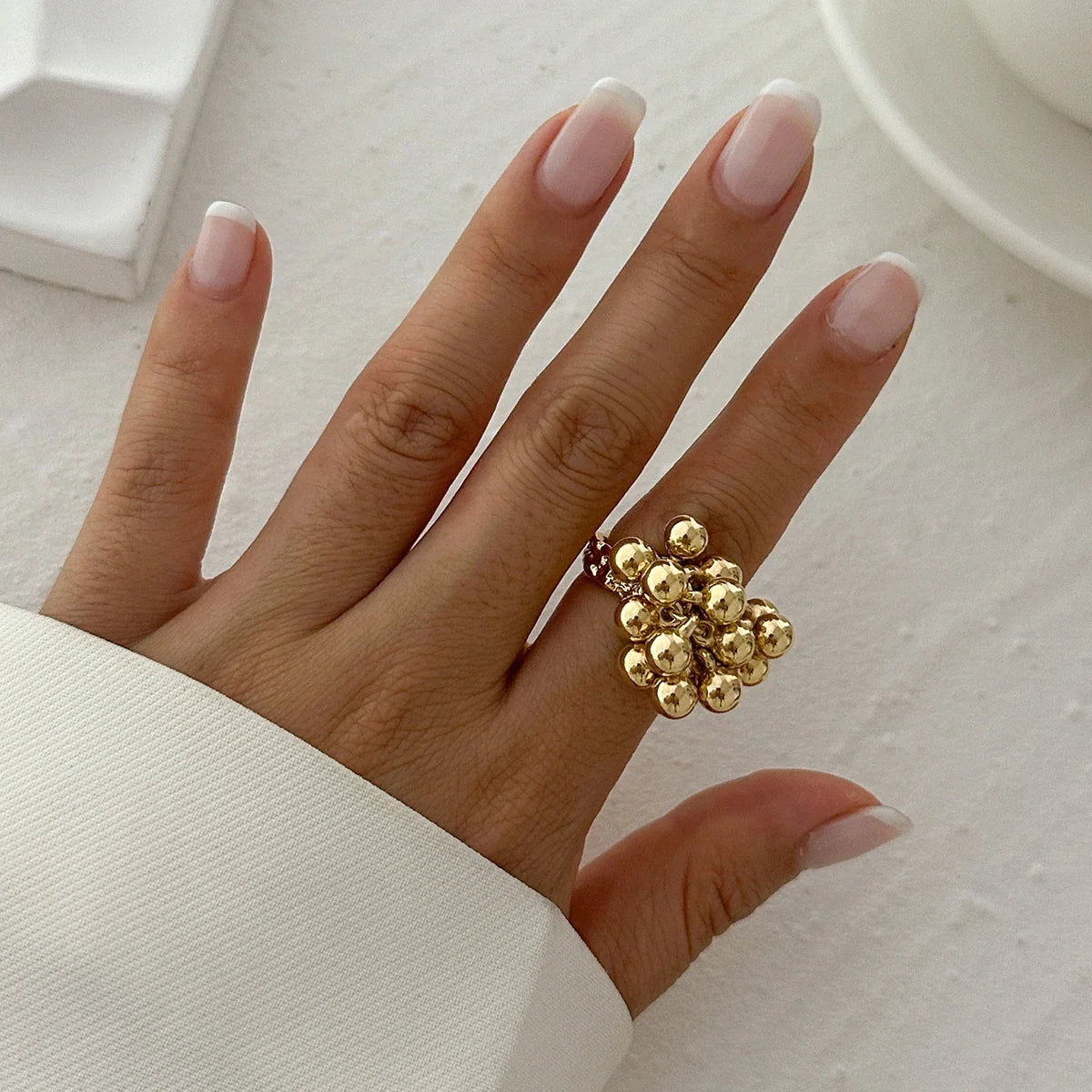 Anillo ajustable de Esferas Dorado