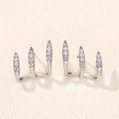 Pendientes de botón elegantes de strass con tres garras