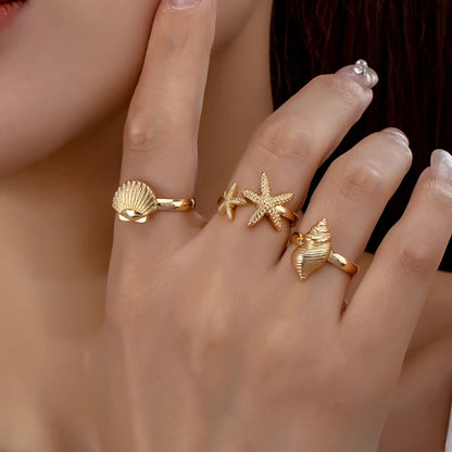 Conjunto de 3 Anillos Dorados Concha Estrella y Caracola