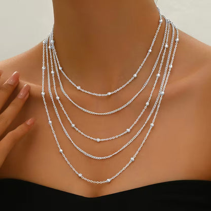 Collar Cadena Multicapa con Borlas Elegantes