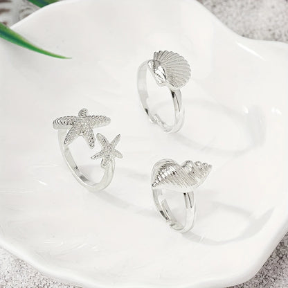 Conjunto de 3 Anillos Dorados Concha Estrella y Caracola