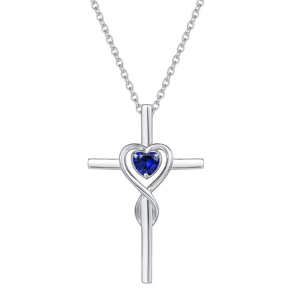 Collar cruz de piedra corazón de zafiro | Oro blanco
