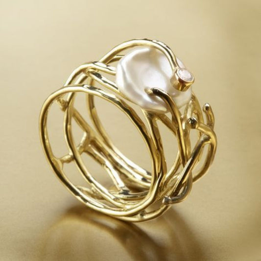 Anillo vintage fino dorado y perla