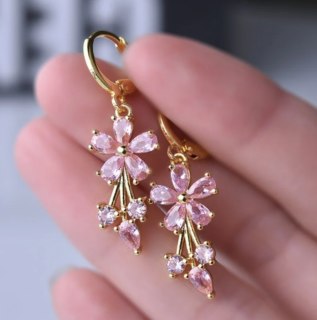 Aros chapados en oro de 18 quilates con margaritas rosas