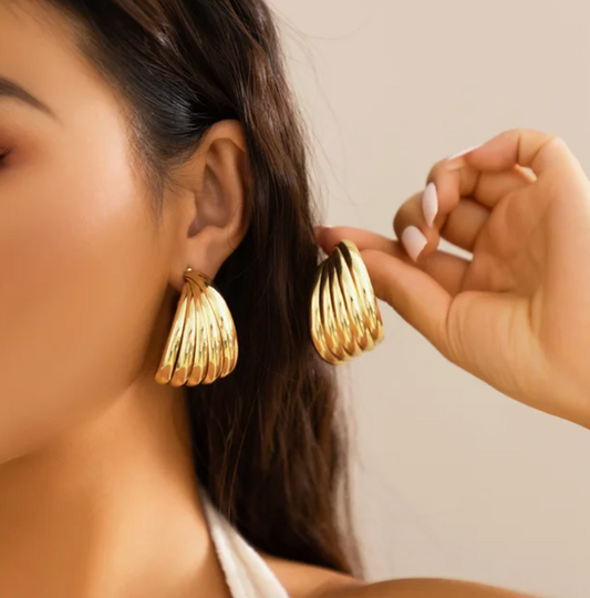 Aretes hamaca dorados de 18 quilates