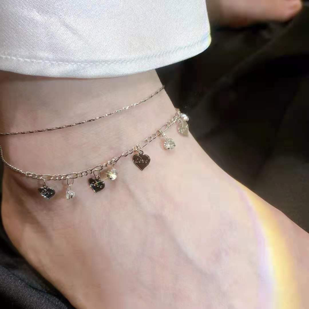 Tobillera de cadena con corazón dorado