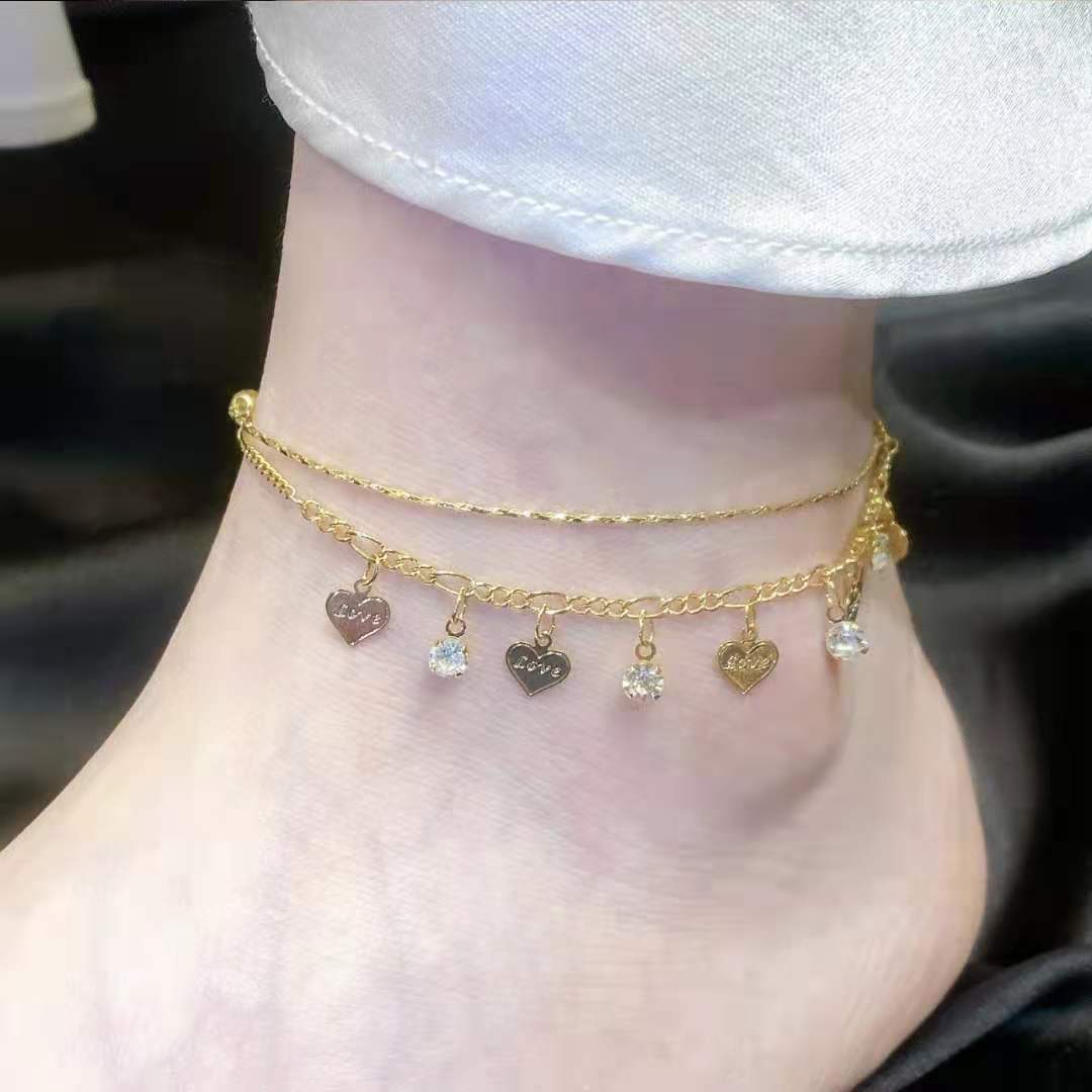 Tobillera de cadena con corazón dorado