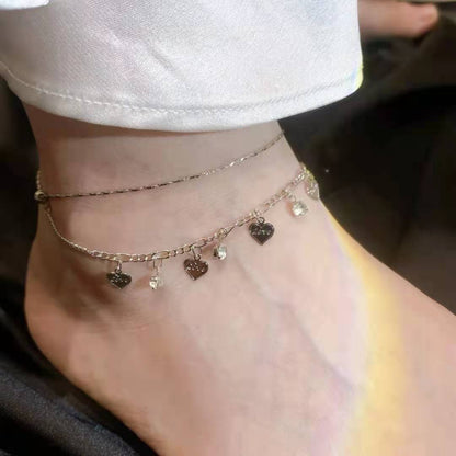 Tobillera de cadena con corazón dorado