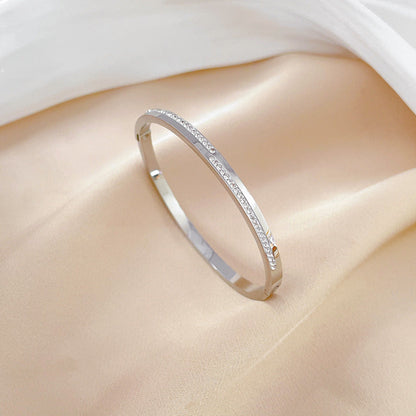 Pulsera rígida de cristal dorado Aera
