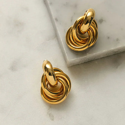 Pendientes Statement Interlocking | Oro blanco