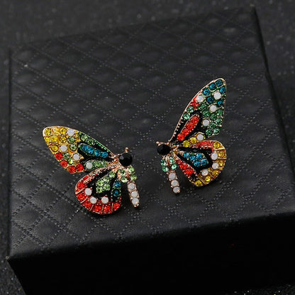 Pendientes de mariposa edición limitada con incrustaciones de circonita
