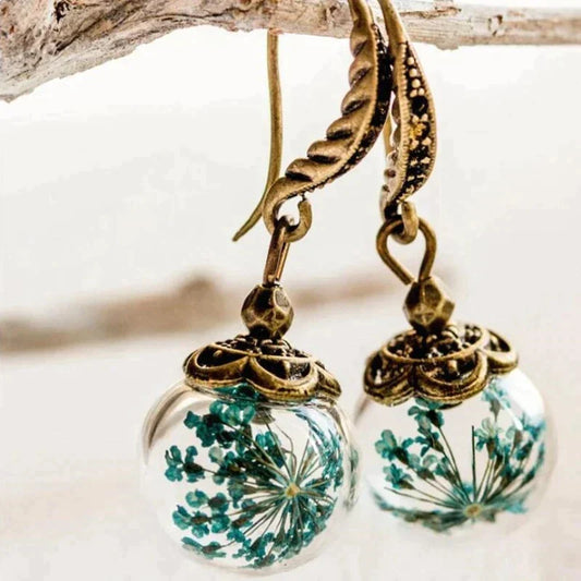 Pendientes exóticos naturales en oro