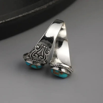 Elegante Anillo Vintage Cruzado de Turquesa