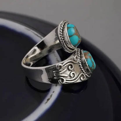 Elegante Anillo Vintage Cruzado de Turquesa