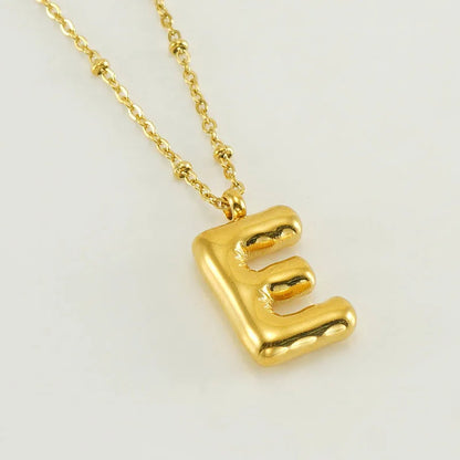 Collar especial de luz dorado de 18 quilates con esfera especial y letra inicial