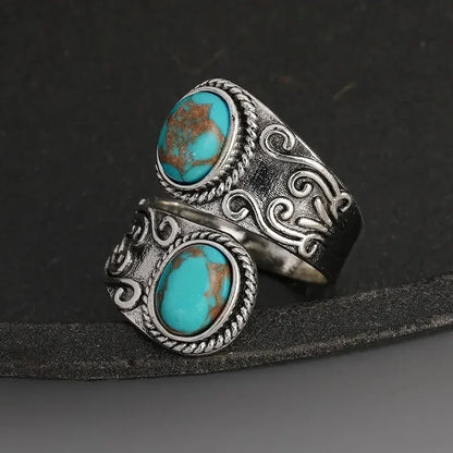 Elegante Anillo Vintage Cruzado de Turquesa