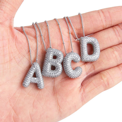 Set de collares con iniciales Bubble Letter | Oro blanco
