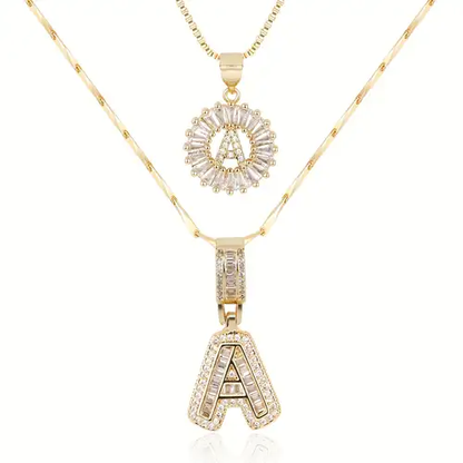 Set de collares con iniciales pavé | Oro blanco