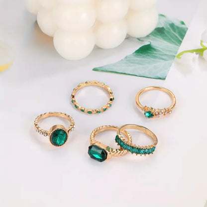 Set exquisito de anillos de esmeralda Zarina | Oro