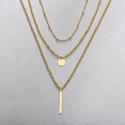 Collar vintage de cadenas superpuestas con colgante geométrico