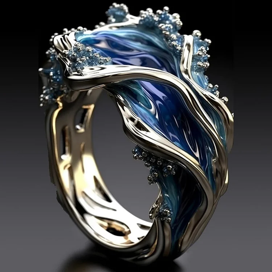 Anillo vintage dorado con forma de olas del mar