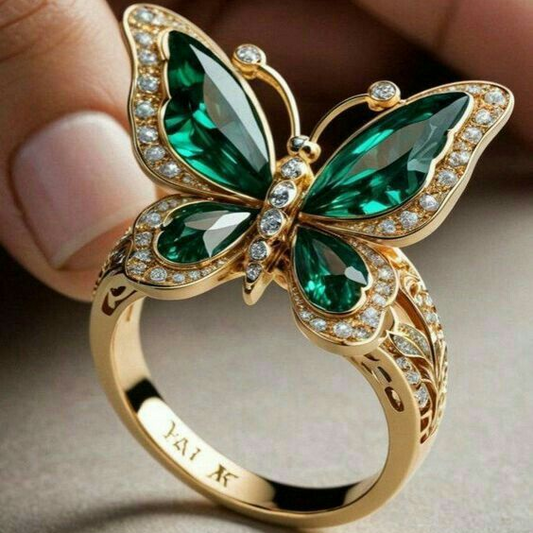 Anillo de mariposa cristalina verde en oro