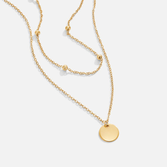 Collar de placas superpuestas